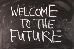 Chalkboard with the words 'welcome to the future' written on it