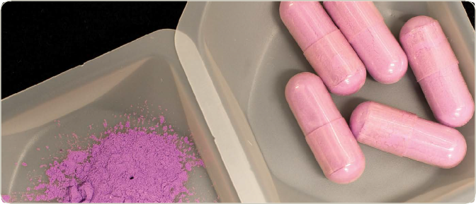 Pink coloured LSD powder and Capsules.