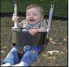Toddler in a swing