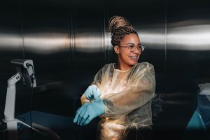 nursing student smiling in lab