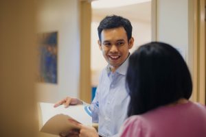 student and faculty engaged in positive conversation