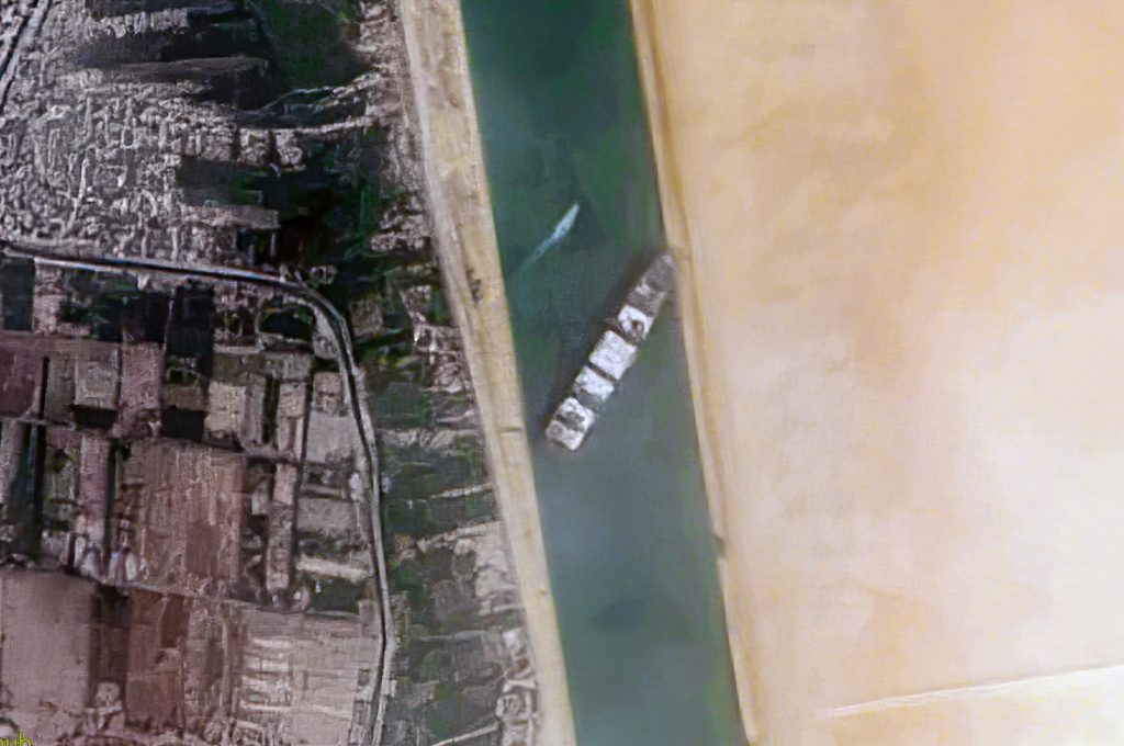 Container Ship 'Ever Given' stuck in the Suez Canal, Egypt - March 24th, 2021.