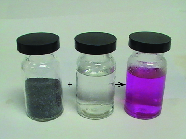 Three glass containers with lids are shown in a photo. A plus sign is drawn between the first two containers and a right-facing arrow is drawn between the second and third containers. The left container holds a black granular solid while the center container holds a clear, colorless liquid. The right container holds a clear, pink liquid.