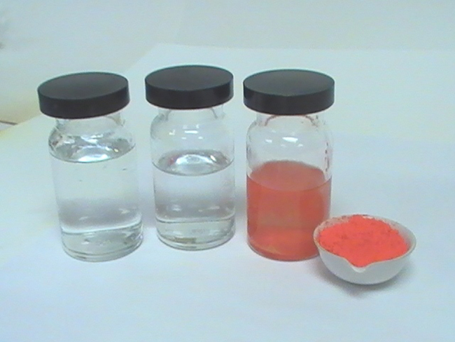 This figure shows three bottles and one bowl. All the bottles have lids. The first bottle is filled with a clear liquid. The second bottle is filled with a similarly clear liquid, but only about three-quarters of the way. The third bottle contains a red or pink liquid. The bowl contains a red or pink solid.