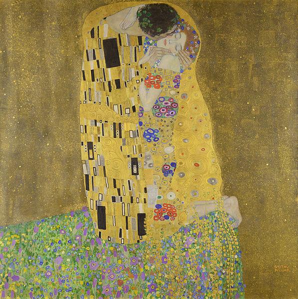 Klimt's "The Kiss," depicting an embracing man and woman wrapped in a patchwork yellow quilt, all painted in an evocative, deliberately unrealistic style.
