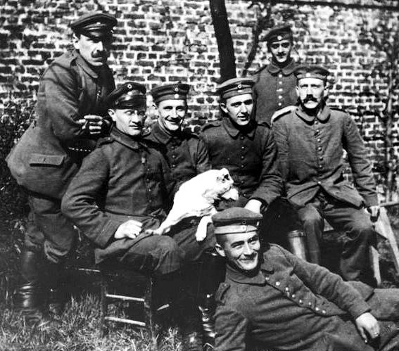 Group of German soldiers, including Hitler, the latter with a longer mustache than he wore later.
