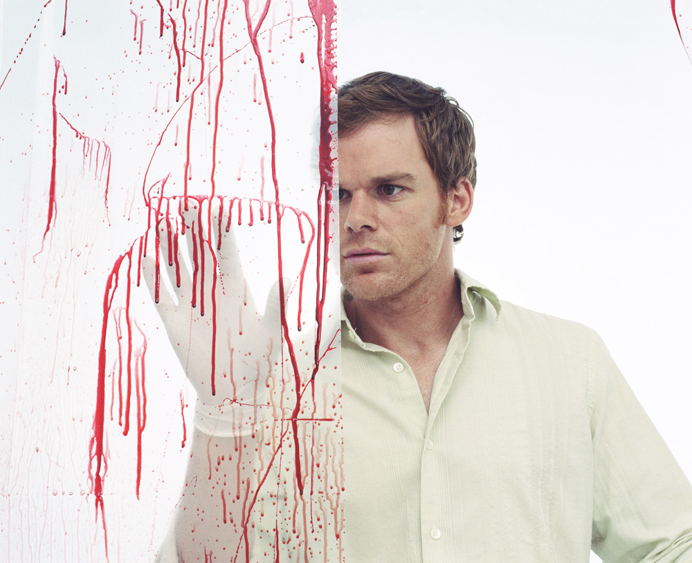 The TV character Dexter, looking at blood splatter on a wall.