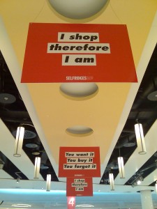 An advertisement saying, "I shop therefore I am"