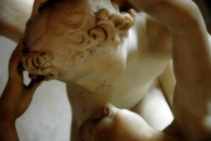 A sculpture of Cupid and Psyche about to kiss