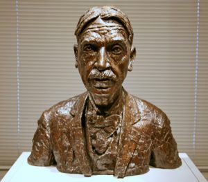 A Bronze bust of John Dewey