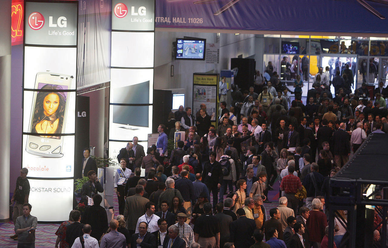 LG at the Consumer Electronics Show with a crowd around its booth