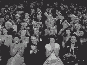 An audience clapping