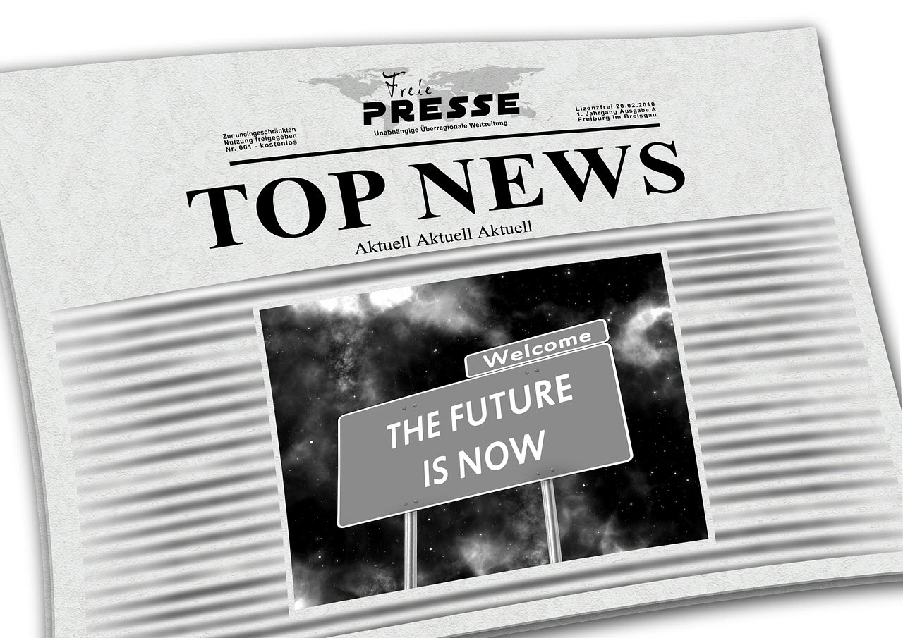 A newspaper reading Top News and an image with a sign The future is now