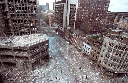 A photograph showing a section of a city empty and in shambles with what appears to be debris cluttering the buildings and streets.